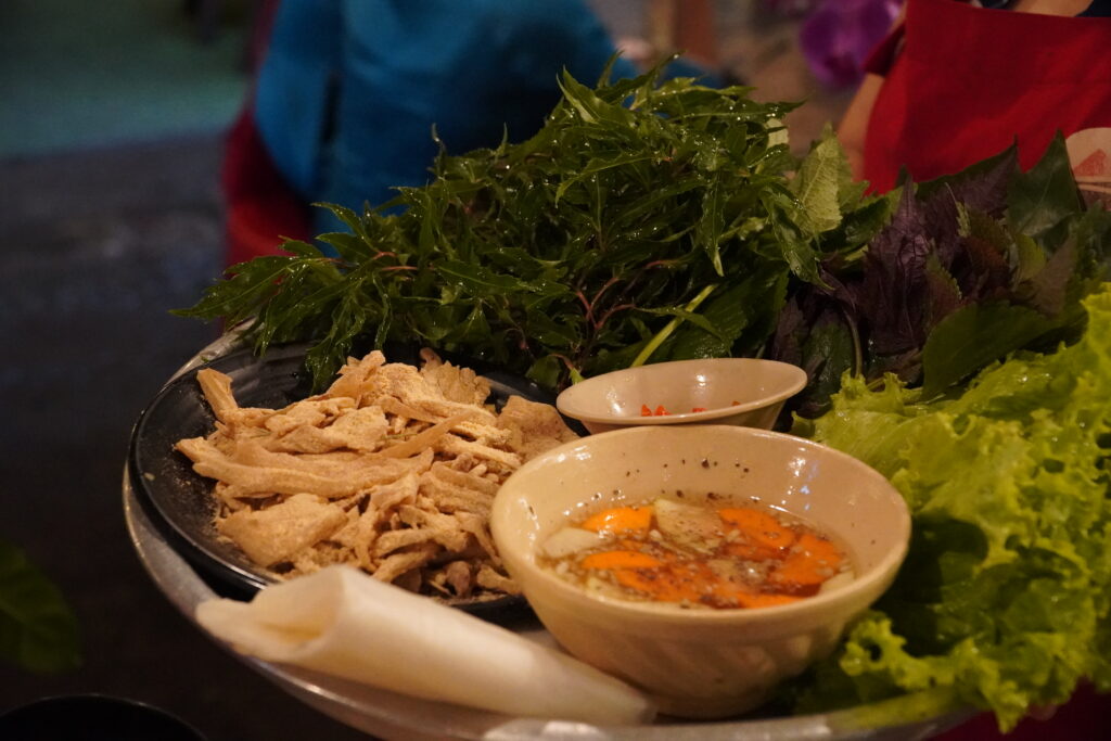 Nem tai trộn thính at Béo Ơi Quán which is recommended by Michelin Guide