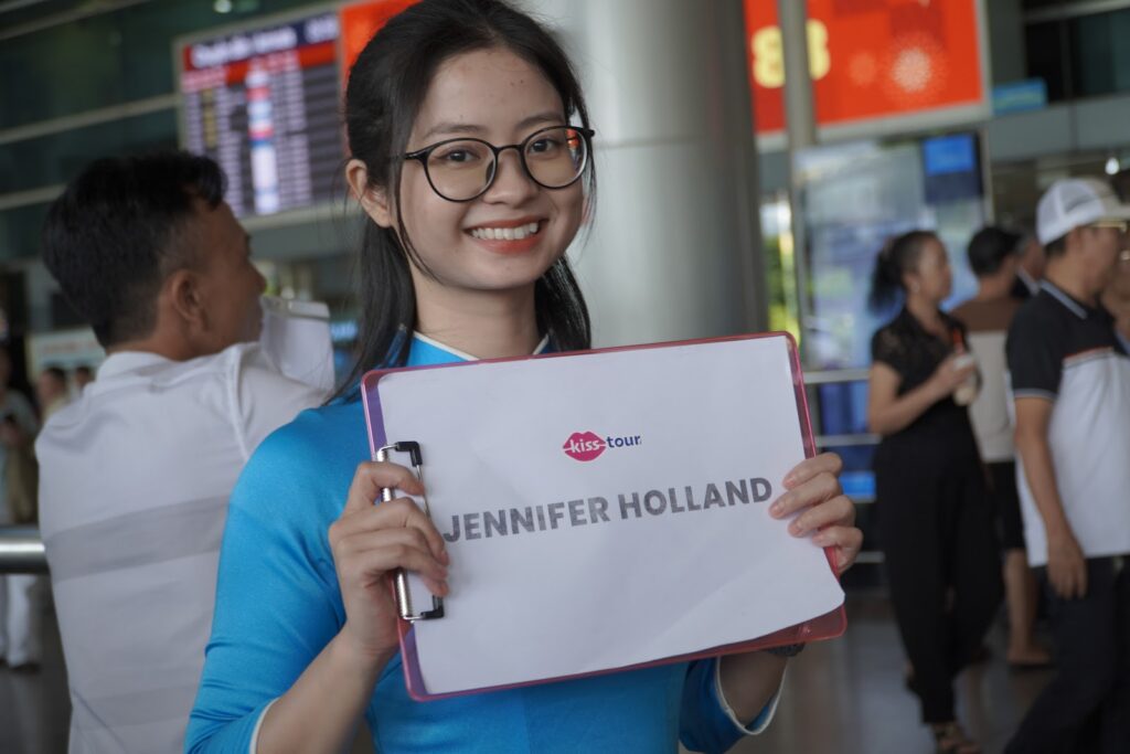 Phu Quoc airport fast track - KissTour staff welcoming guests with a name sign