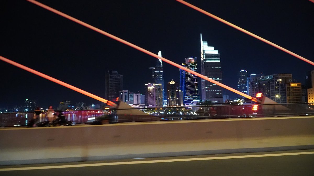 Ho Chi Minh City skyline at night from Ba Son Bridge — a classic view on a first time in Saigon