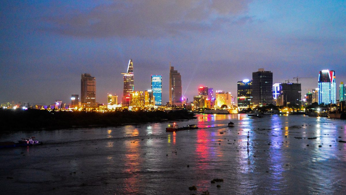 Saigon River dinner cruise — the city skyline lit up at night