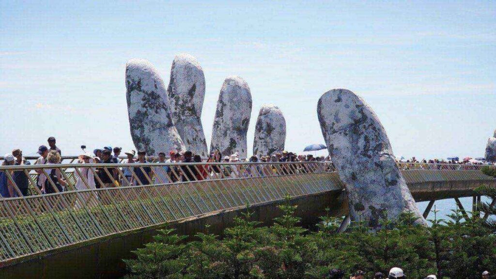 Golden Bridge held by giant stone hands, Ba Na Hills