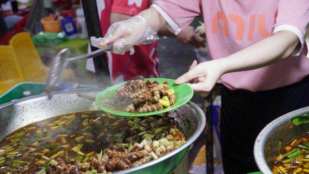 Street food being grilled/served on a food tour