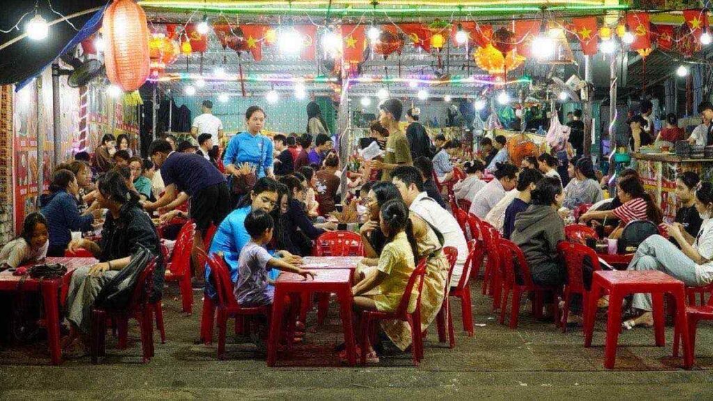 Packed night market food stalls in Da Nang