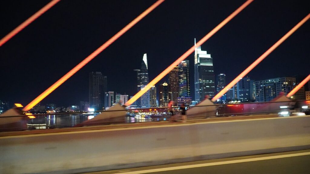 Ho Chi Minh City or Da Nang - the Saigon skyline at night seen from the Ba Son Bridge area