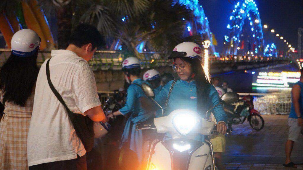 Dragon Bridge lit up at night over Han River