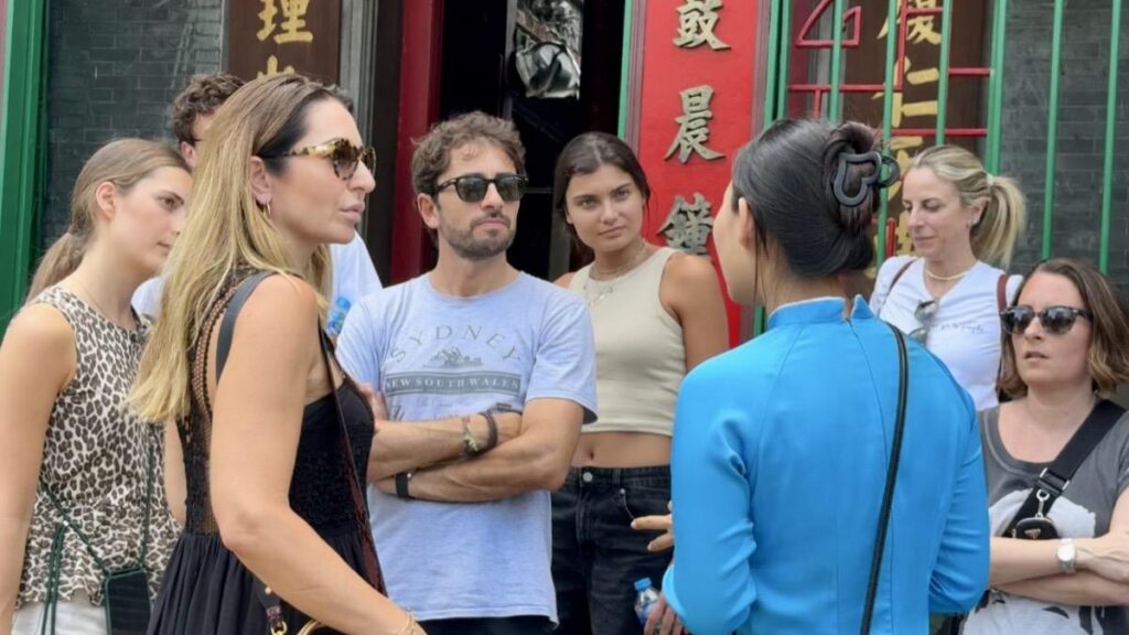 Guests with day bags on a guided Saigon walk