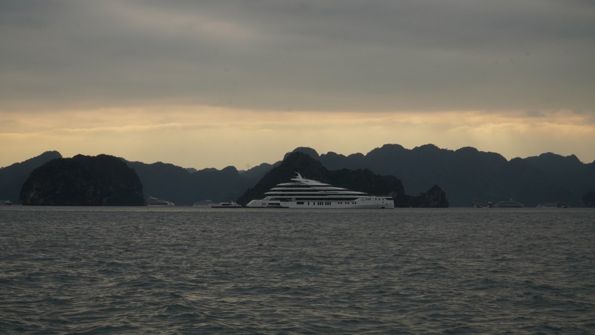 A cruise ship on Ha Long Bay at dusk