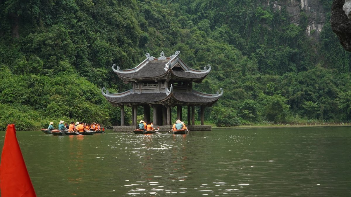 A temple pavilion on the water at Trang An, Ninh Binh