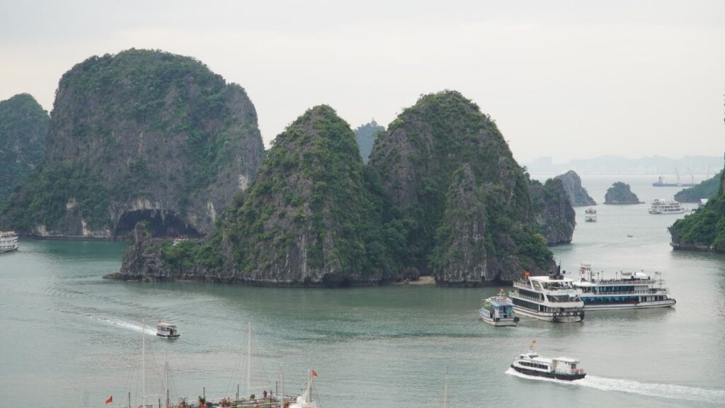 Overnight cruise boat sailing through Ha Long Bay on a 5-day Northern Vietnam itinerary