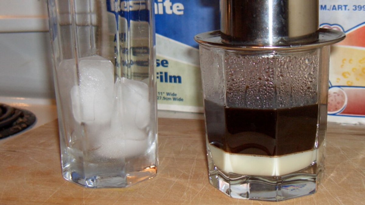 A glass of Vietnamese iced coffee, ca phe sua da, at a Saigon cafe