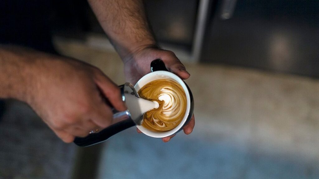 Net-filter coffee being made at a traditional Saigon cafe